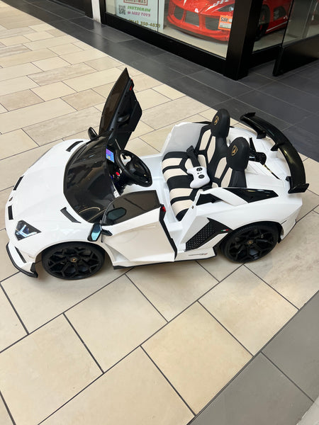 💯 Free Shipping 
TOUCH TV LICENSED LAMBORGHINI AVENTADOR 2 SEAT 24 VOLT DRIFT 4 MOTORS WITH REMOTE OVER-RIDE PAINTED WHITE