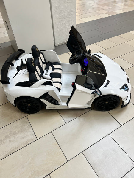 💯 Free Shipping 
TOUCH TV LICENSED LAMBORGHINI AVENTADOR 2 SEAT 24 VOLT DRIFT 4 MOTORS WITH REMOTE OVER-RIDE PAINTED WHITE