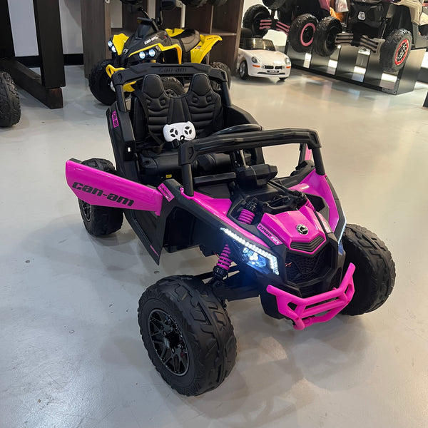 A 24V Licensed Can am ride on toy car Touch TV UTV 4 x 4 Rubber Tires Leather Seat Hot Pink