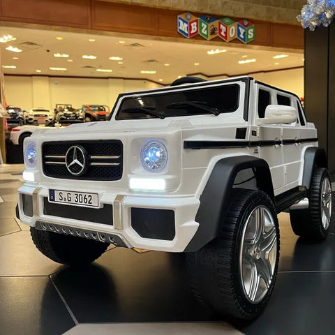 LICENSED MAYBACH MERCEDES AMG UPGRADED 12V 7AH WITH TOUCH TV, PARENTAL REMOTE, RUBBER TIRES AND LEATHER SEAT AGES 1-4 SPRAY WHITE NOT AVAILABLE TILL DECEMBER 15th