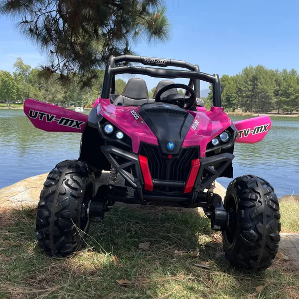 UTV MX R/C TOUCH TV , 24V , 2x12v. AGES 1-5 4x4 , UTV MX 2000 , ATV, RAZOR STYLE, PARENTAL REMOTE CONTROL OR PRESS ON PEDAL AND GO.. LEATHER SEAT , RUBBER TIRES , 4WD PINK