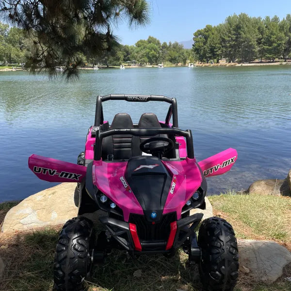 UTV MX R/C TOUCH TV , 24V , 2x12v. AGES 1-5 4x4 , UTV MX 2000 , ATV, RAZOR STYLE, PARENTAL REMOTE CONTROL OR PRESS ON PEDAL AND GO.. LEATHER SEAT , RUBBER TIRES , 4WD PINK