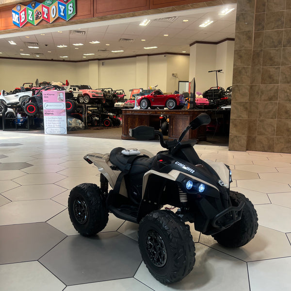 LICENSED CAN AM QUAD RIDE ON WITH PARENTAL REMOTE CONTROL RUBBER EVA TIRES LEATHER SEAT 4 X 4 USE PARENTAL REMOTE OR PRESS ON PEDAL AND GO…AGES 2-5 - BLACK / TAN