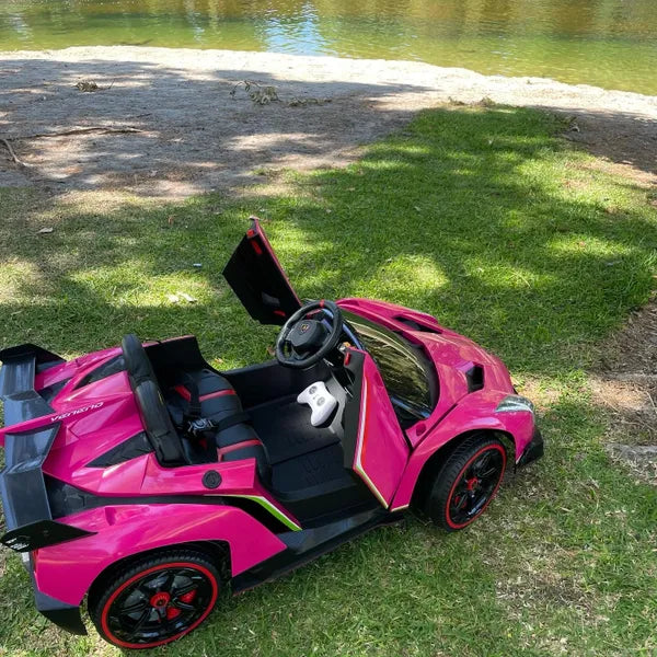 LICENSED LAMBORGHINI 2 SEAT VENENO 24 VOLT 4 MOTORS WITH TOUCH SCREEN TV AND REMOTE OVER-RIDE PAINTED PINK