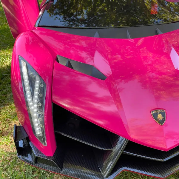 LICENSED LAMBORGHINI 2 SEAT VENENO 24 VOLT 4 MOTORS WITH TOUCH SCREEN TV AND REMOTE OVER-RIDE PAINTED PINK