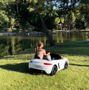 XXL PORSCHE STYLE 24 V 14 AH LUXURY ELECTRIC GO CART WITH REAL AIR- FILLED TIRES CENTER DIFFERENTIAL AND DISC BRAKES WITH TOUCH TV, BLUETOOTH LEATHER SEATS AGES 6 – 14 FRONT AND BRAKE LIGHTS